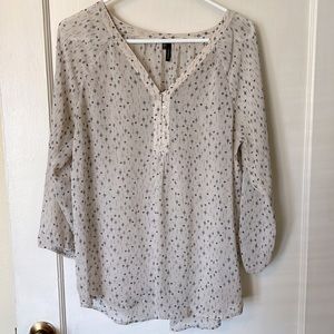 Cream colored Maurice’s size large blouse
